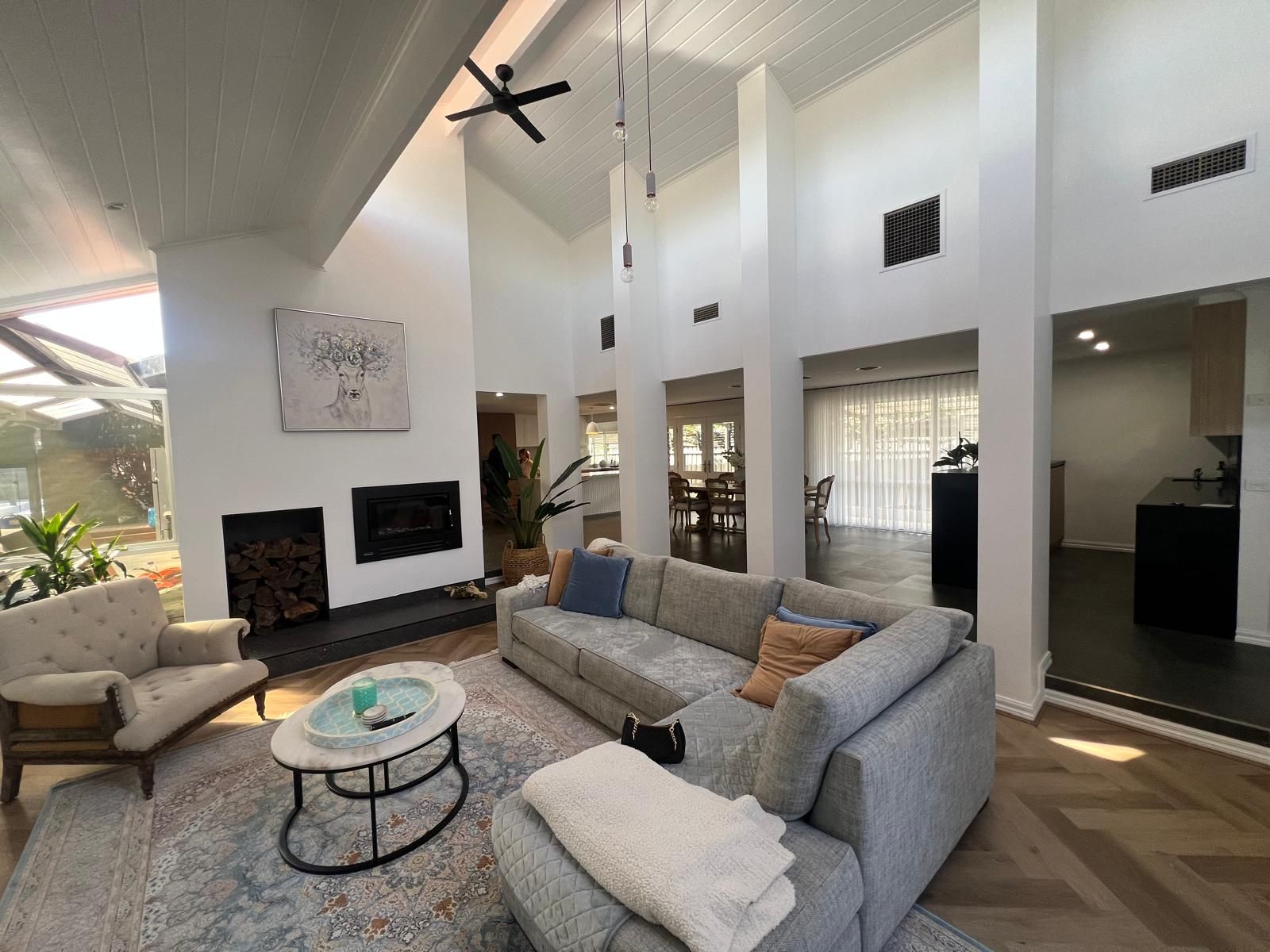 Renovated living room with fireplace and built-in joinery